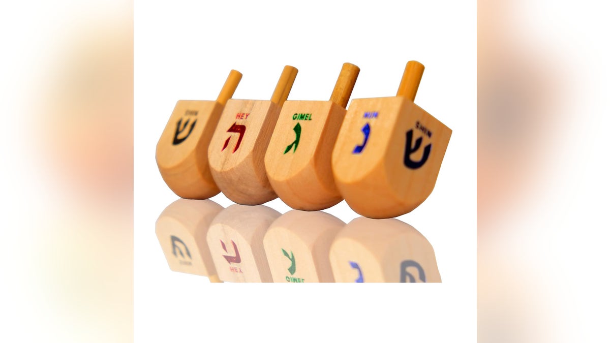 Dreidel is a classic game families play on Hanukkah. 