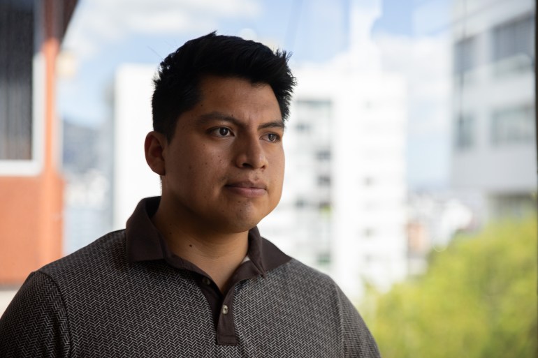 Brandon Samueza poses for a photo outdoors in Quito