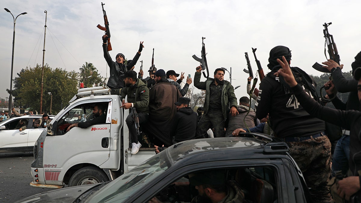 People celebrate in Damascus after fall of Assad regime