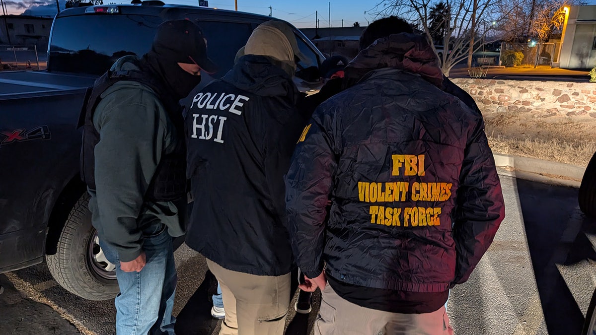 Officers from Homeland Security and the FBI conduct immigration enforcement in El Paso, Texas