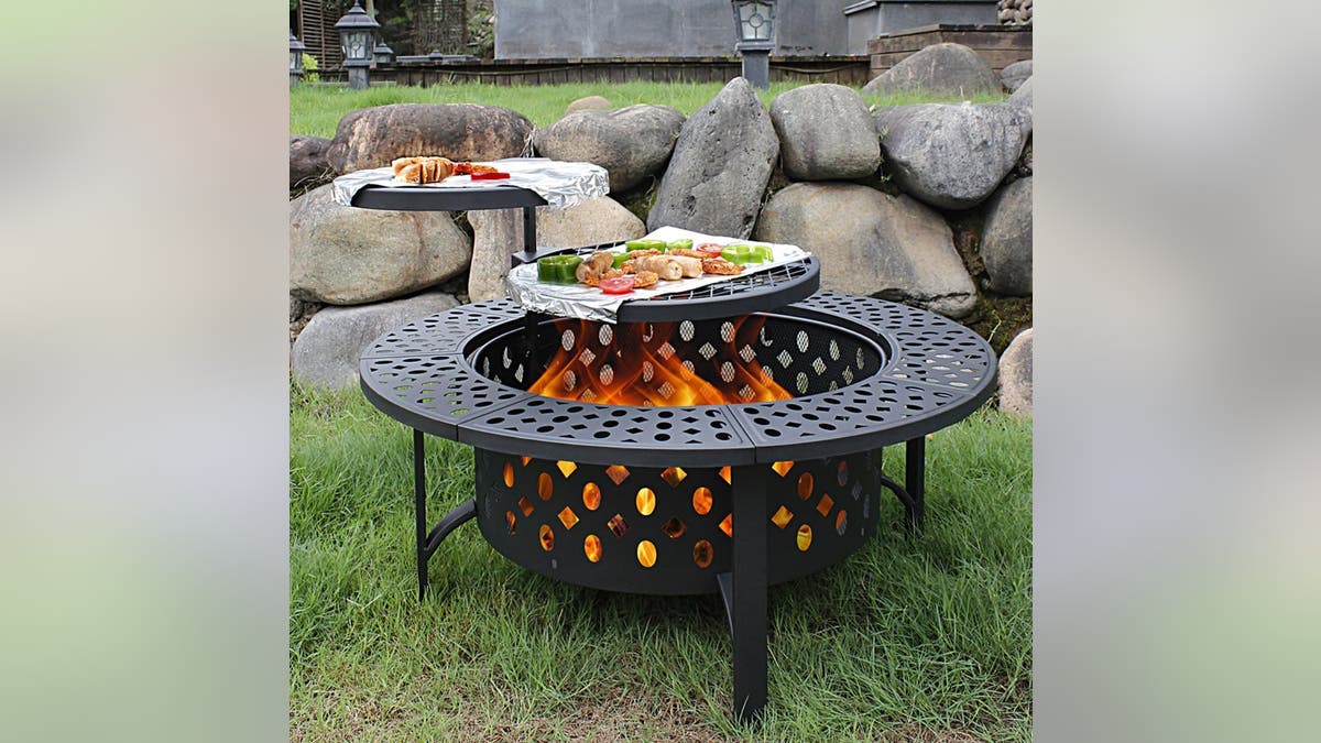 Cook all your meals over an open fire with this fire pit setup. 