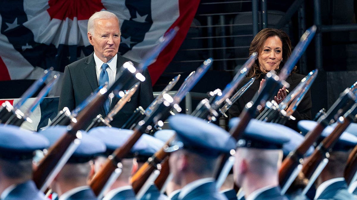 Biden and Harris watching troops