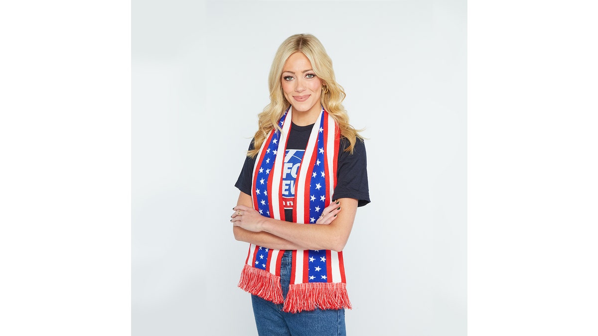 Stay warm in your red, white and blue scarf. 