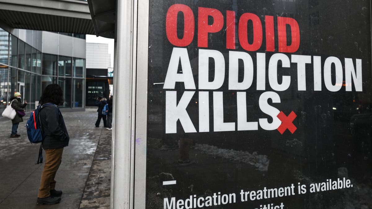 A sign warning about the dangers of opioid addiction in Canada promoting medically-assisted treatment.