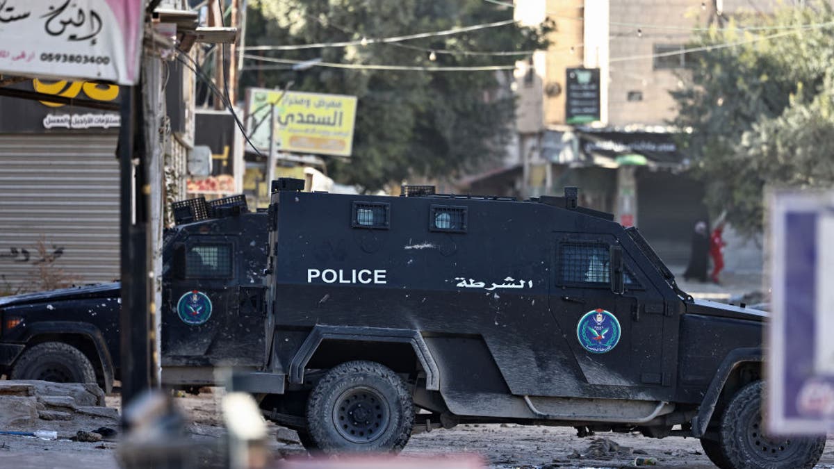 Police vehicles on the street in the West Bank