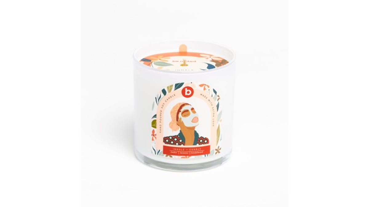 A candle with notes of sandalwood and amber. 