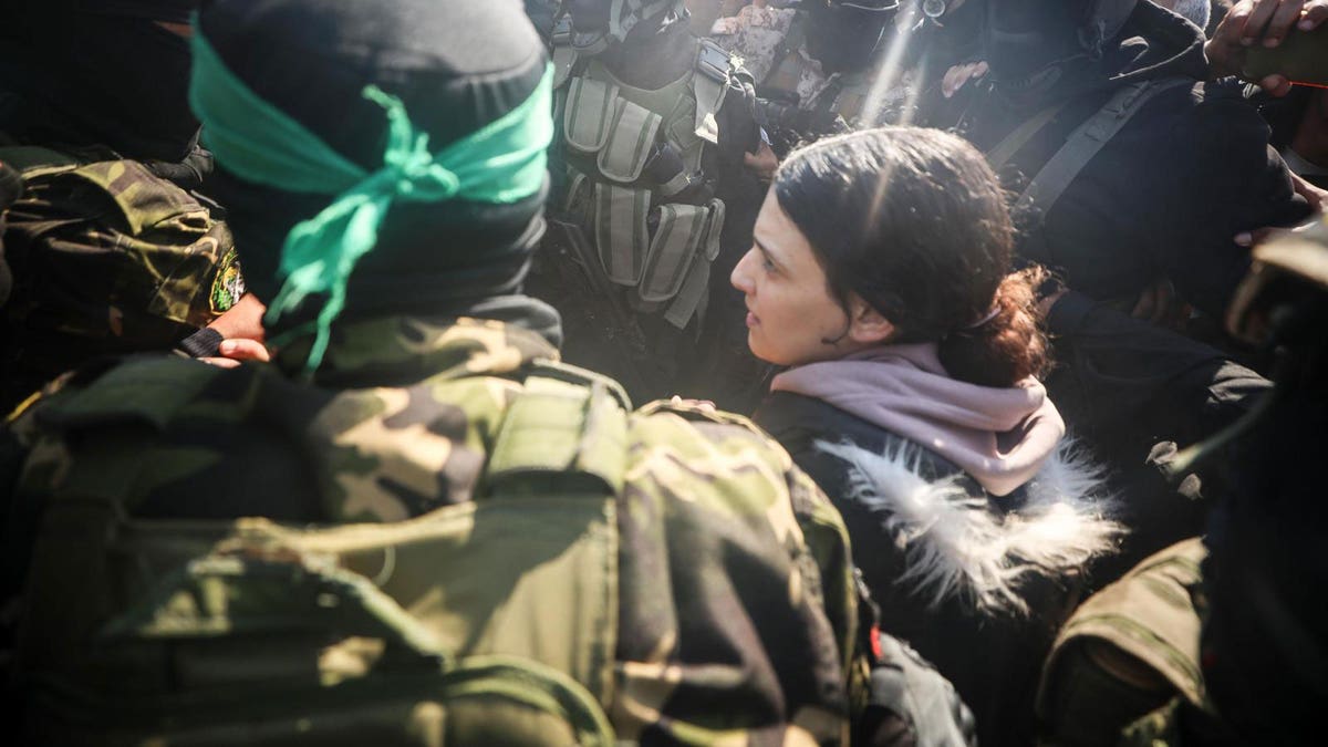 Scenes of chaos in Khan Younis, as hostages Gadi Moses and Arbel Yehud were forced to walk on foot through a Palestinian mob to waiting Red Cross vehicles on Jan. 30, 2025.