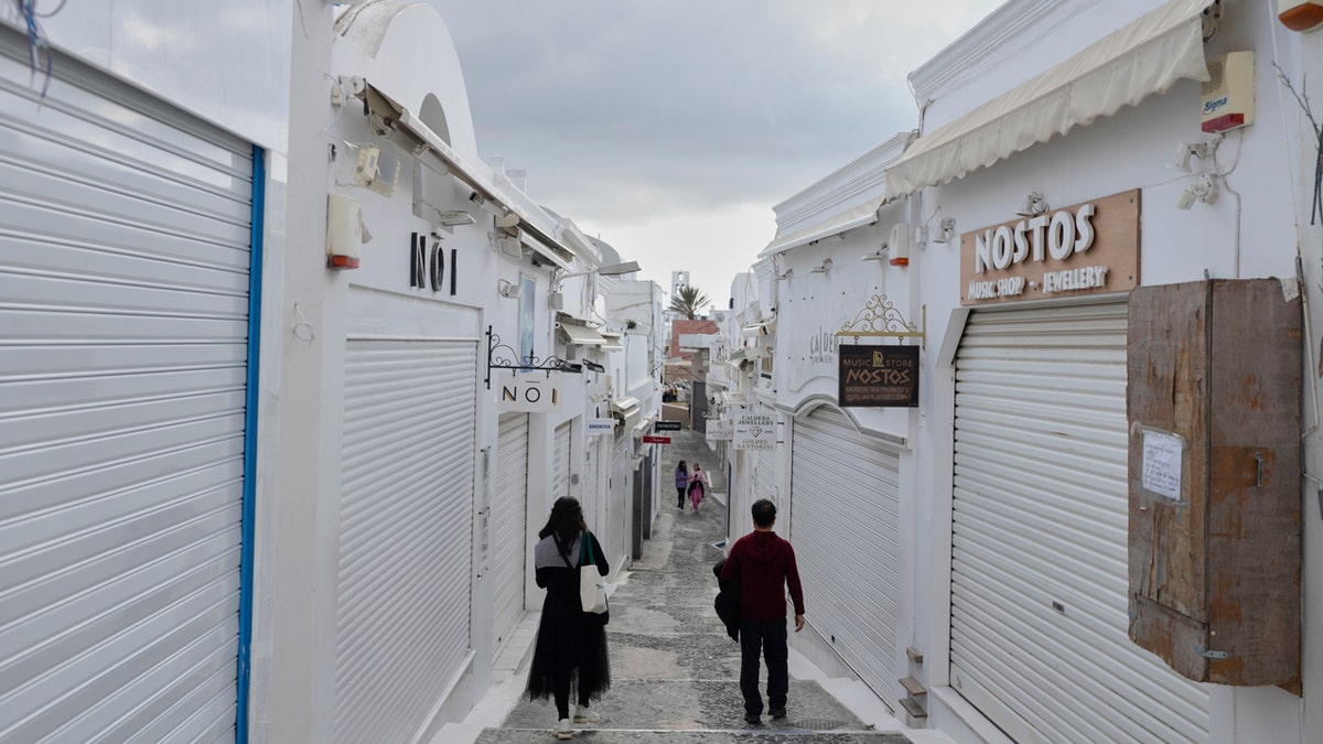 Shops in the town of Fira on the Aegean Sea holiday island of Santorini are seen closed as the town makes preparations for a potential earthquake following the detection of more than 200 earthquakes nearby.