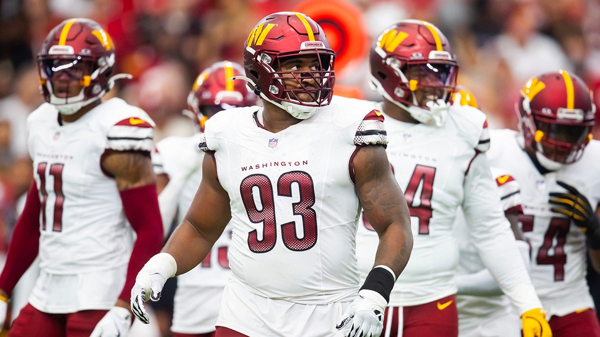 Jonathan Allen looks on