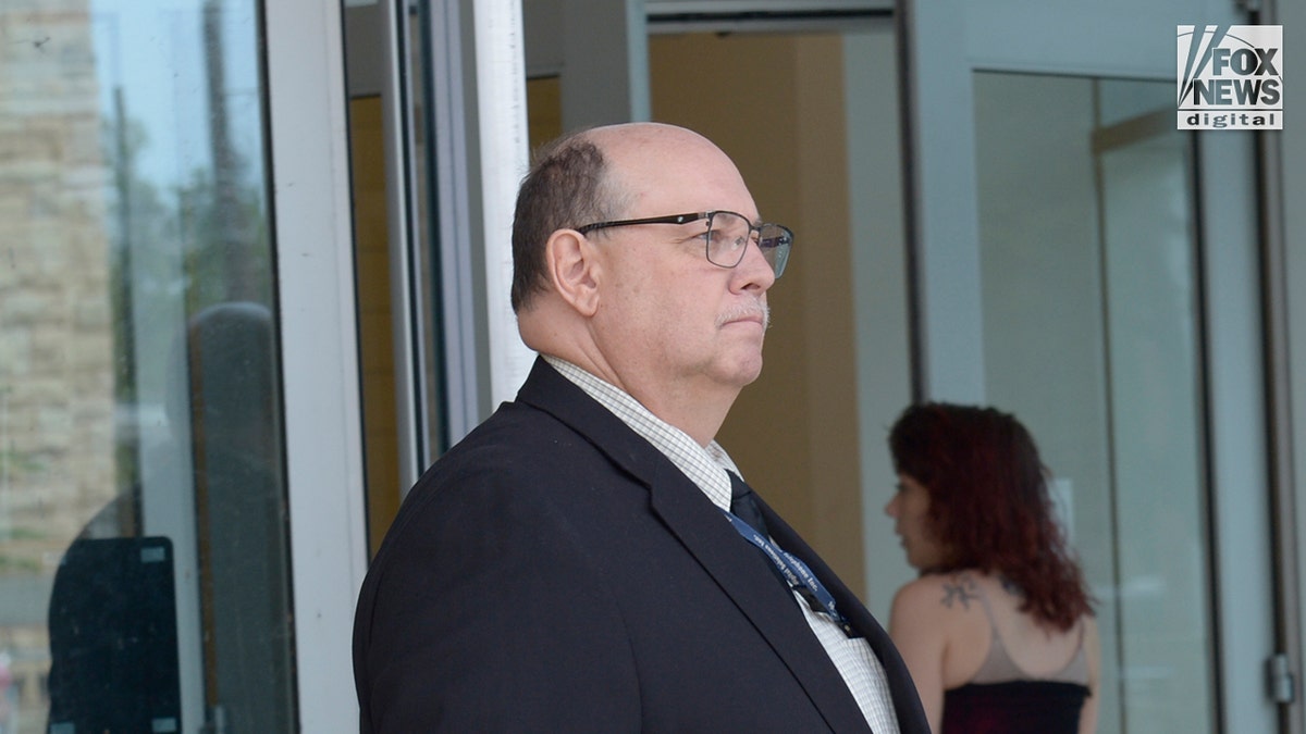 Witness for the Kohberger trial William Searfoss leavest court.