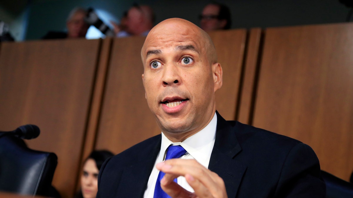 In this Sept. 4, 2018, photo, Senate Judiciary Committee member Sen. Cory Booker, D-N.J. speaks during the committee's Supreme Court nominee Brett Kavanaugh's nominations hearing on Capitol Hill in Washington. Bookerhas released a new batch of "committee confidential" documents about Kavanaugh, even after a conservative judicial group referred his earlier disclosures to the Senate Ethics Committee. The documents released Sept. 12 show Kavanaugh's involvement in President George W. Bush-era judicial nominations, including some that were controversial. Judicial Watch wants the Ethics Committee to investigate as a possible violation of Senate rules. (AP Photo/Manuel Balce Ceneta)