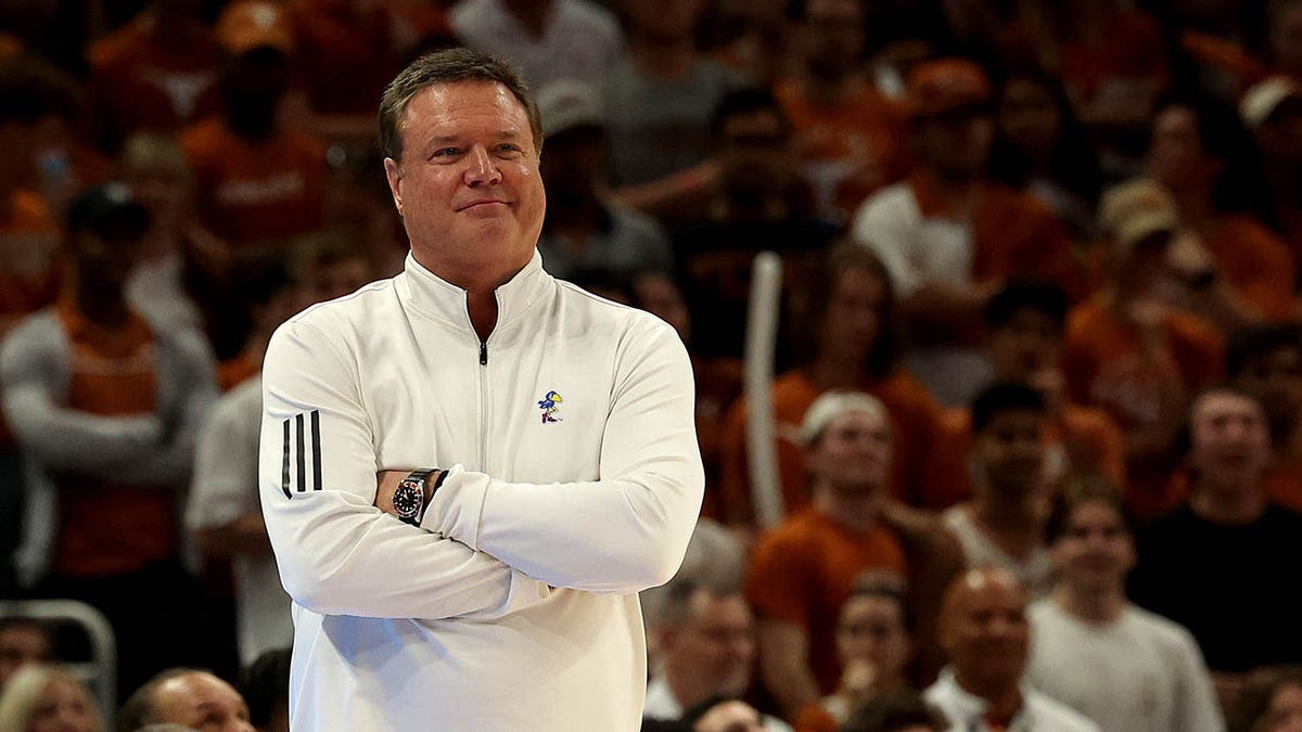Bill Self on the court during a KU game
