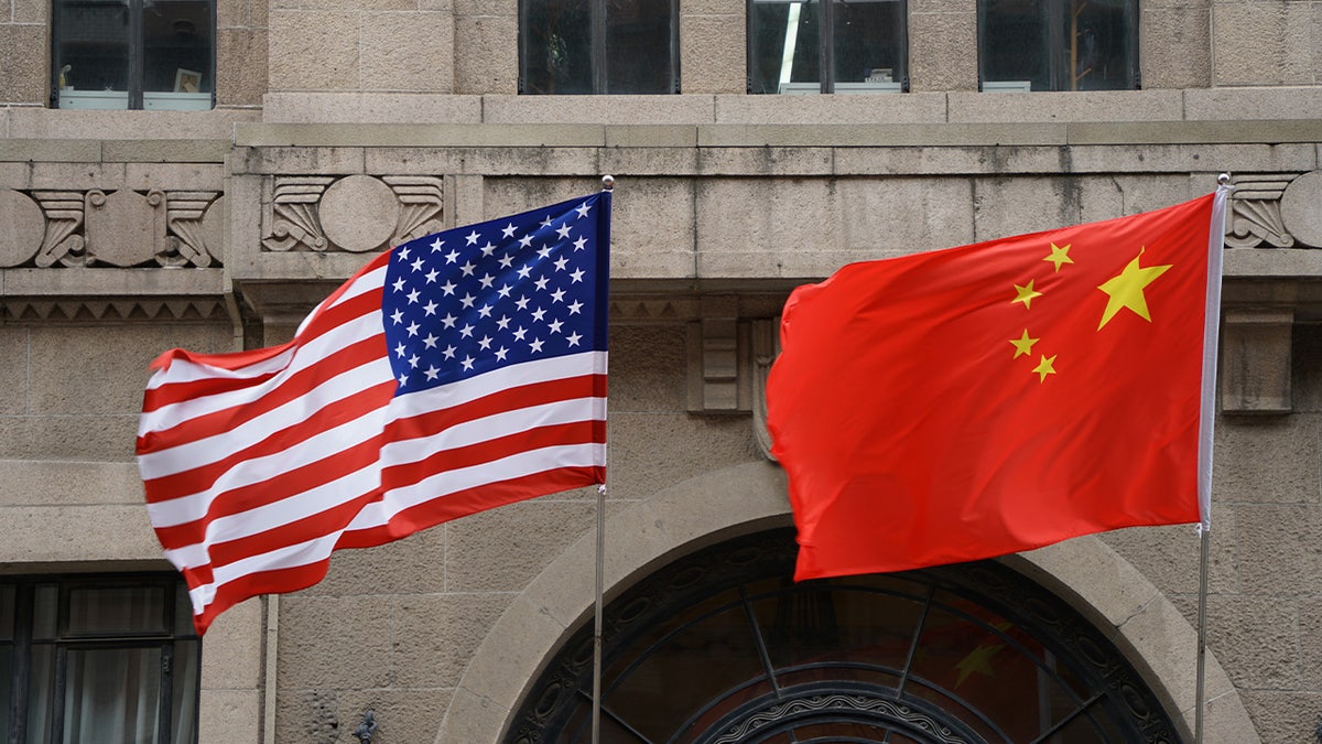 US and China flags at hotel in Shanghai