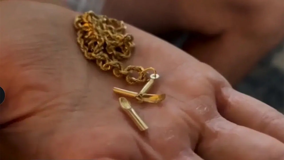 florida man shot with bullet survived from cross necklace