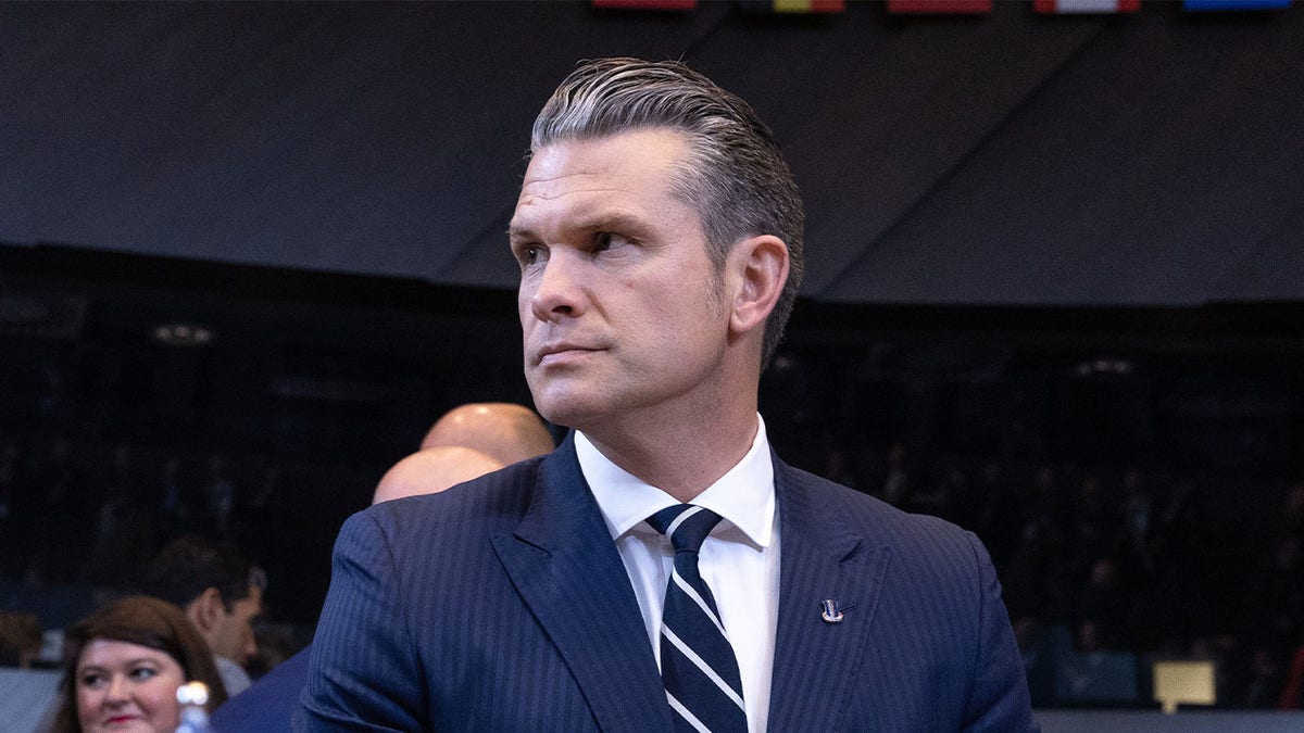 Image depicts Secretary of Defense Pete Hegseth.