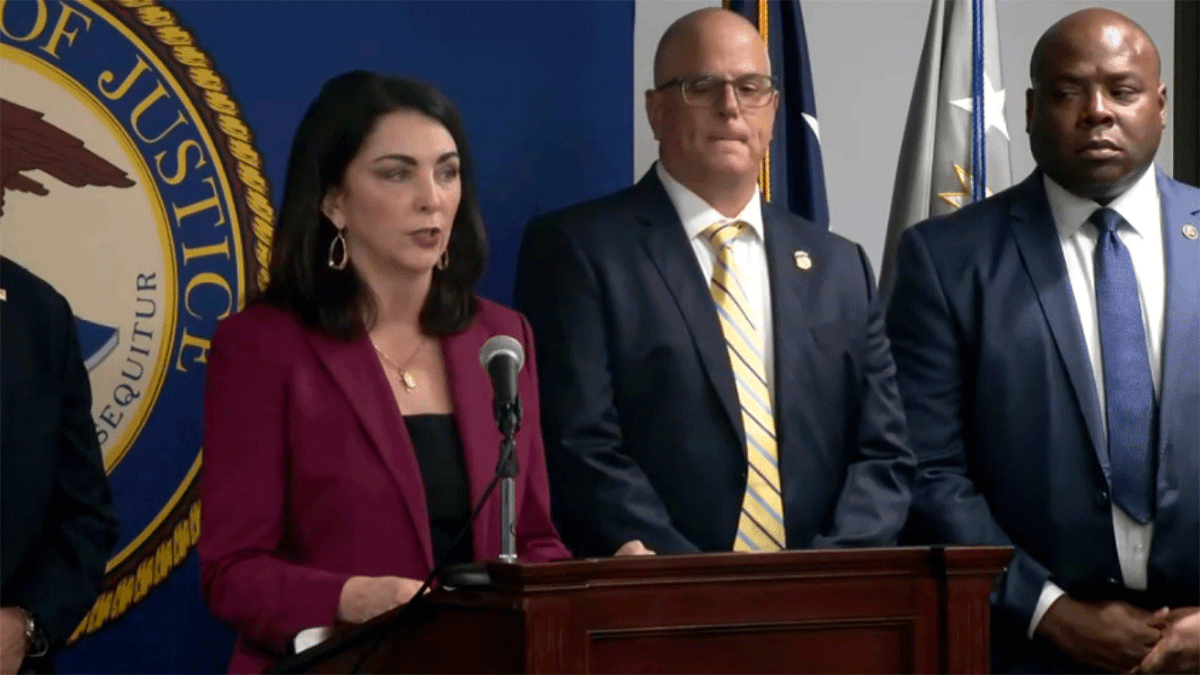 Nancy Larson speaking at a press conference in Dallas, Texas