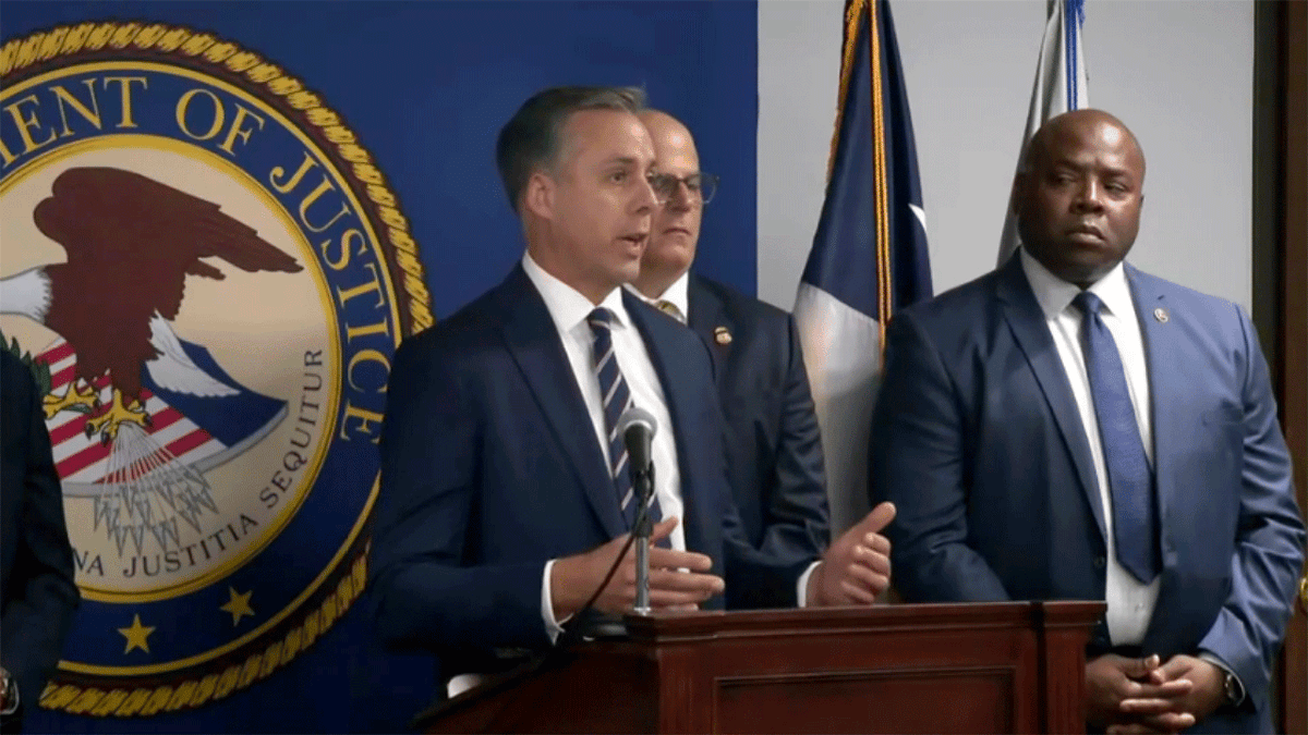 Joseph Rothrock speaks at the podium during a press conference in Dallas, Texas