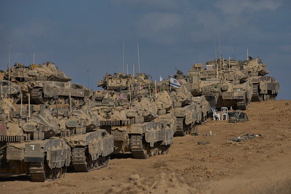 Israeli tanks at a staging area near the border with the Gaza Strip, in southern Israel on Sunday.
