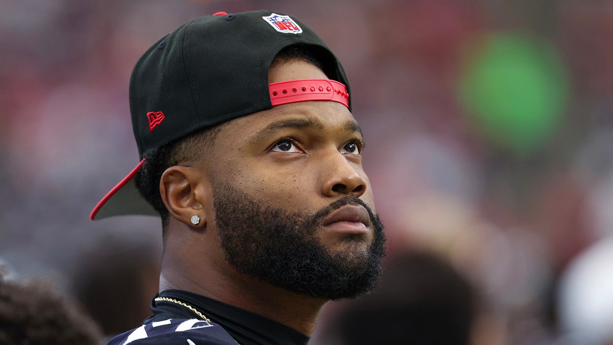 Nico Collins looks on during a game