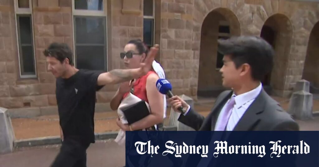 Supporters lash out at cameras outside court