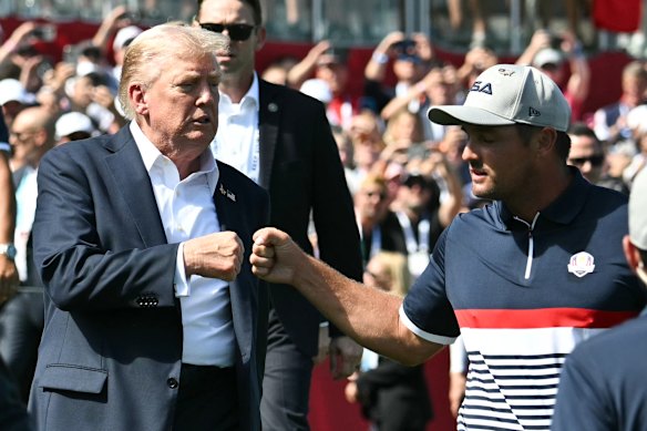 Trump and American golfer Bryson DeChambeau at the Ryder Cup this year.