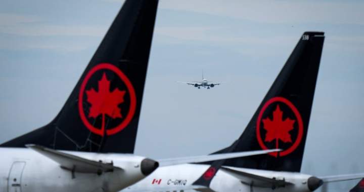Air Canada cuts hundreds of management jobs