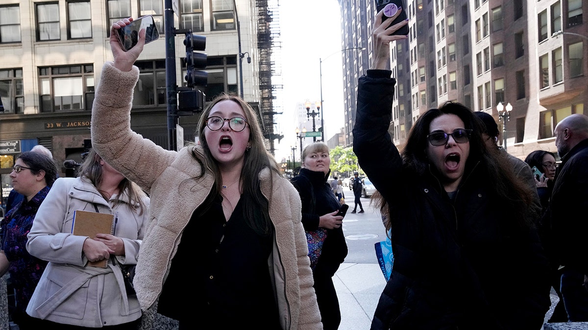 Chicago protesters yell at Gregory Bovino