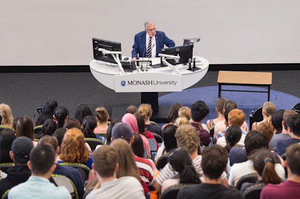 Professor John Murtagh, always a teacher in demand, delivers a lecture at Monash University.