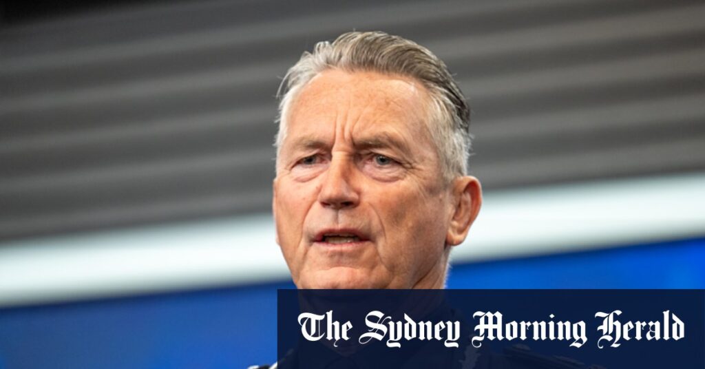 Victoria Police chief Mike Bush apologises for using force helicopter to fly to Hobart conference