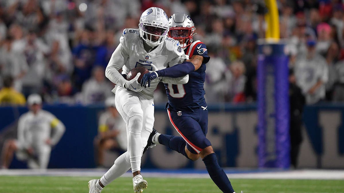 Josh Palmer catches the football