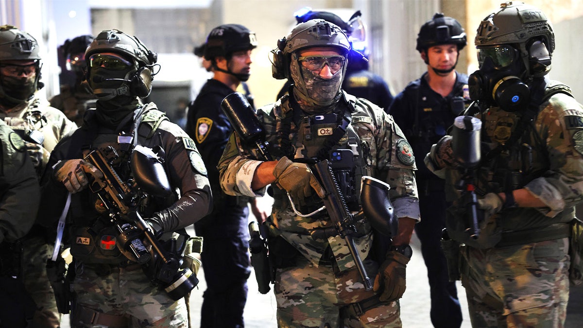 Federal troops outside an ICE facility in Portland, Oregon