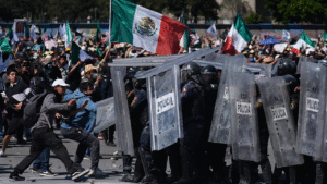Protesters attack police, breach barrier at Mexico’s National Palace during rally against cartel violence