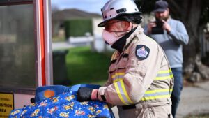 Man charged over house fire that killed two children dies while on bail