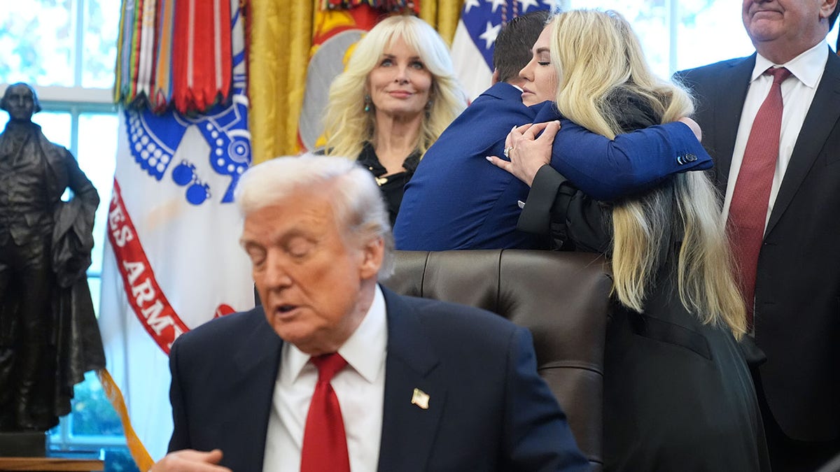 Erika Kirk's hugs Sergio Gor.