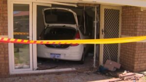 Car ploughs into family’s living room