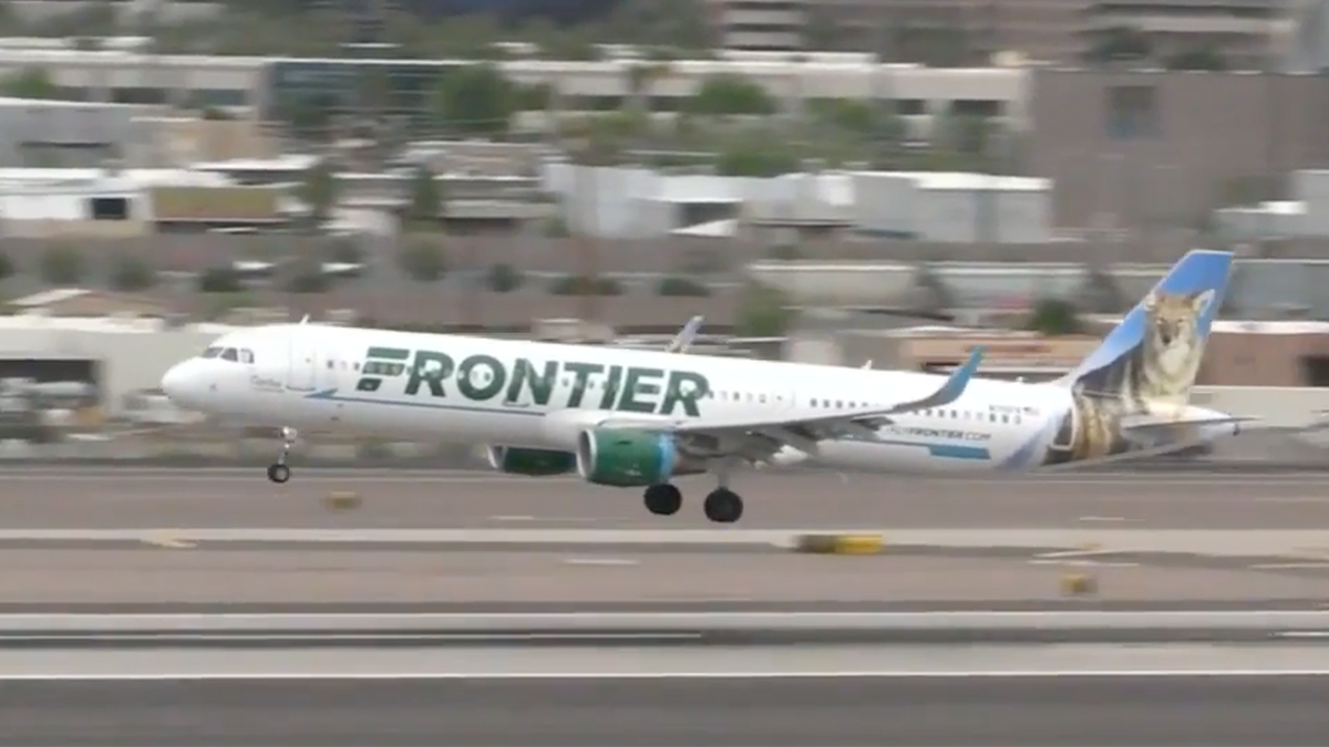 A Frontier plane takes off at the Atlanta airport.