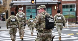 Officials instructed to pause all asylum decisions in wake of National Guard shooting