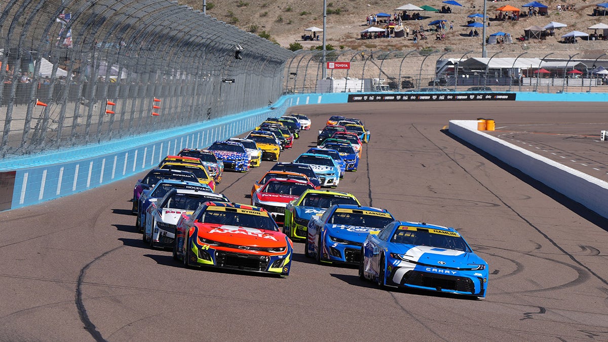 Denny Hamlin battles for the lead