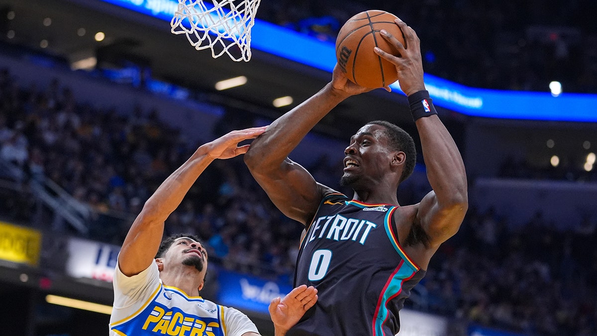 Jalen Duren grabs a rebound