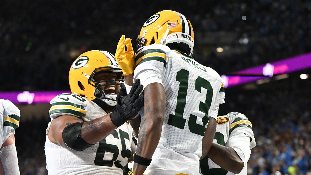 Dontayvion Wicks celebrating.