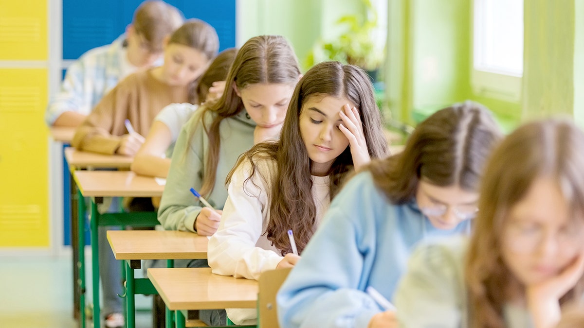 Students taking a test in a classroom
