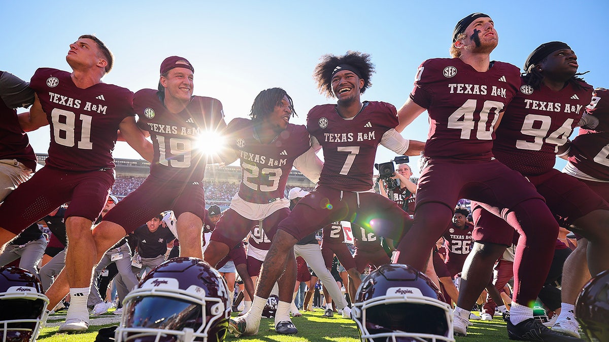 Texas A&M football players celebrate