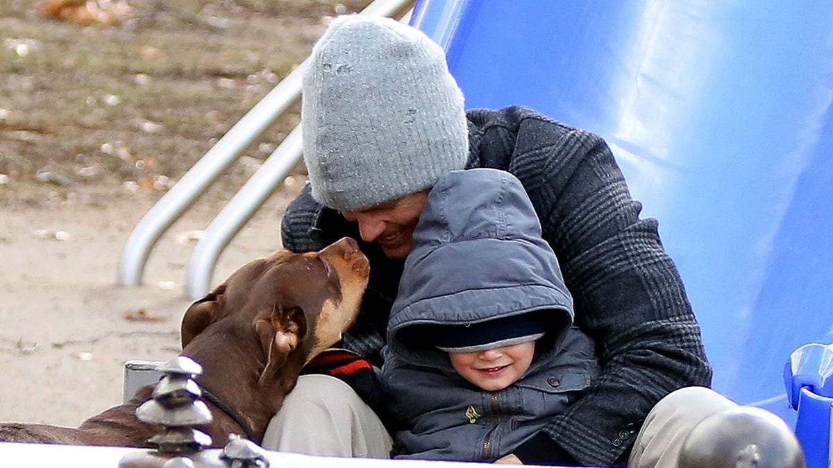 Tom Brady plays with son and dog