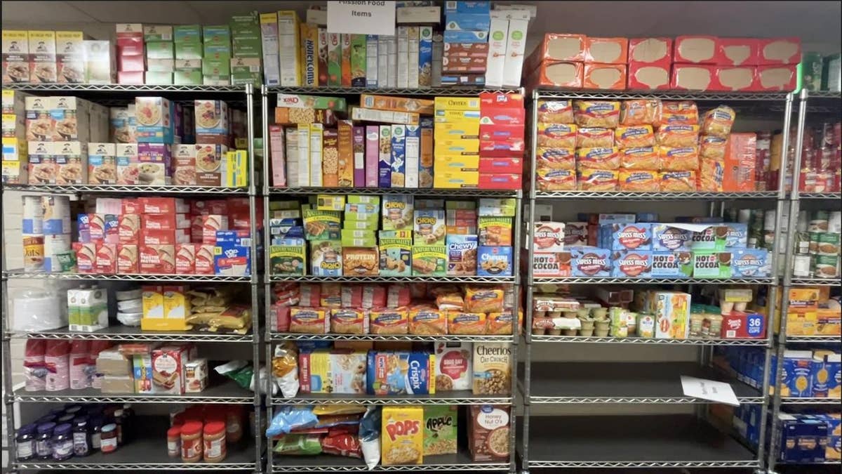 shelves filled with cereal boxes and pantry staples at washington street mission in springfield