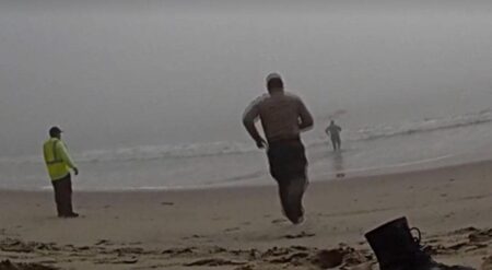 LA deputies caught on camera racing into foggy ocean to rescue disoriented paragliders