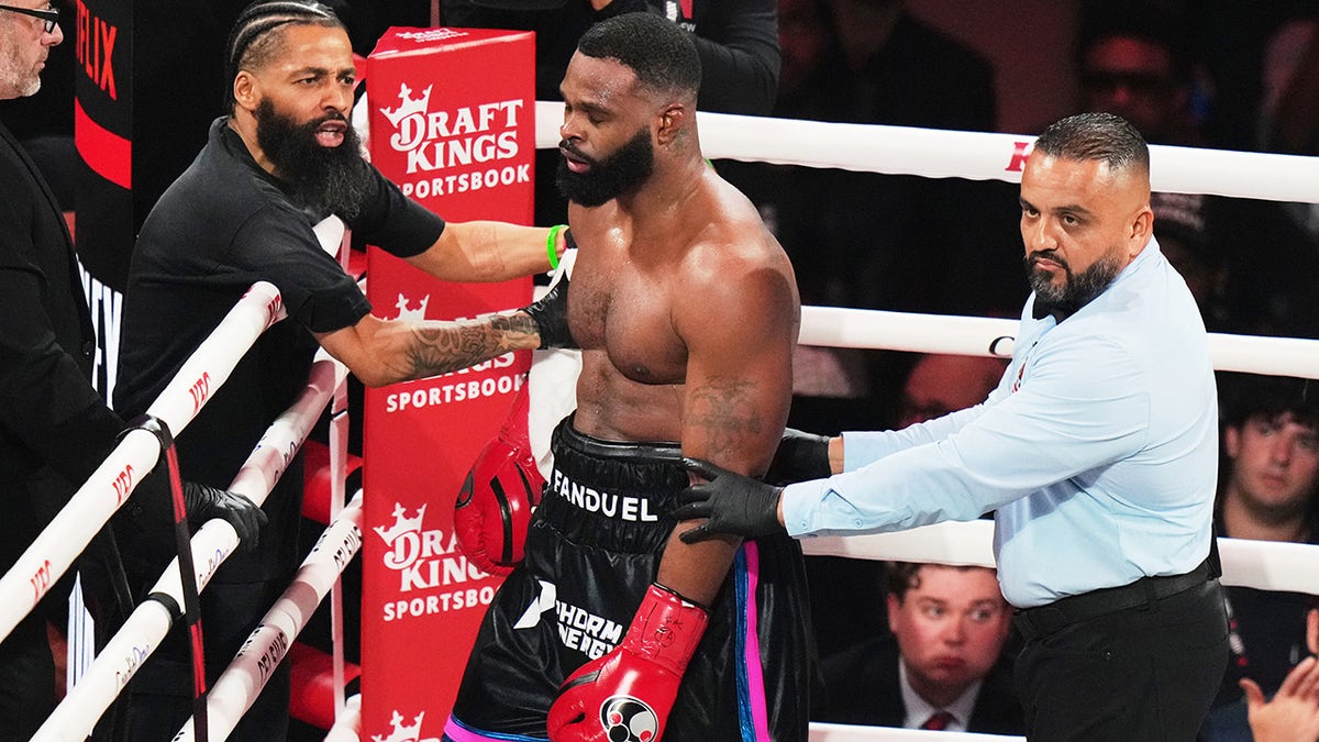 Tyron Woodley walks to the corner