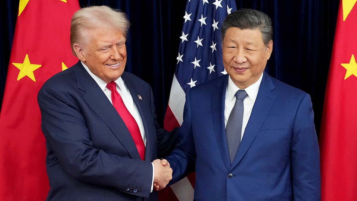 U.S. President Donald Trump shakes hands with Chinese President Xi Jinping