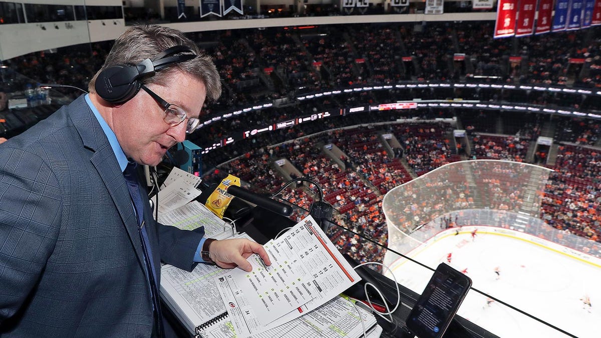 Tim Saunders looks on