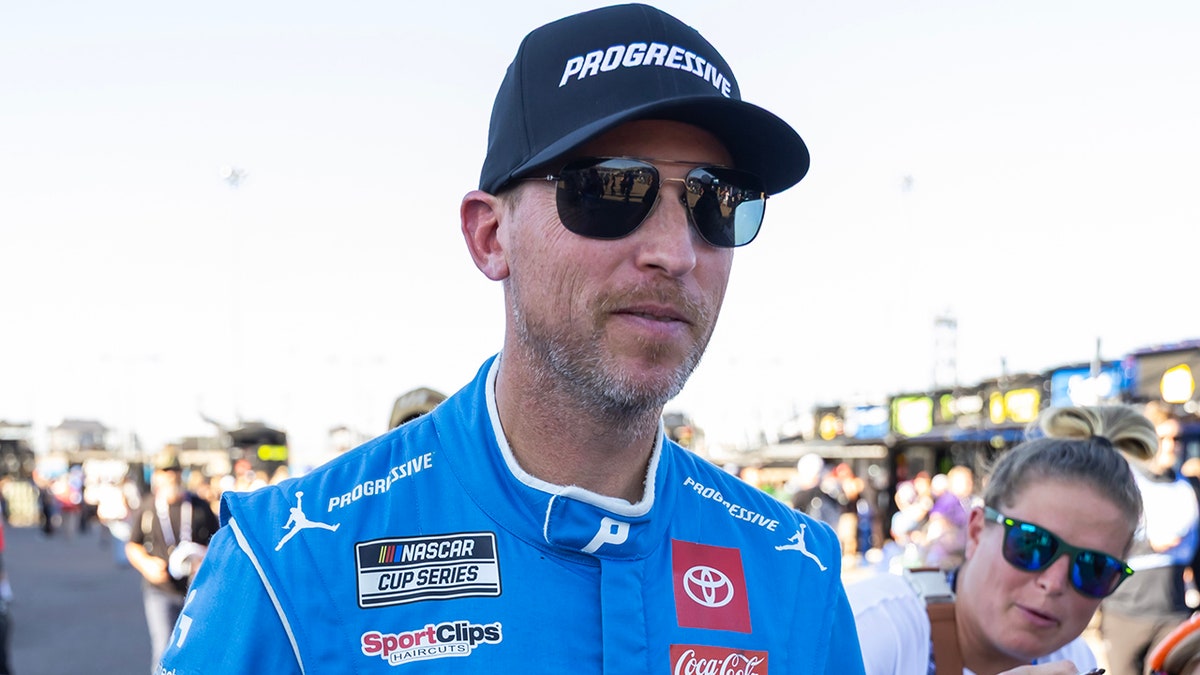 Denny Hamlin walks the grid