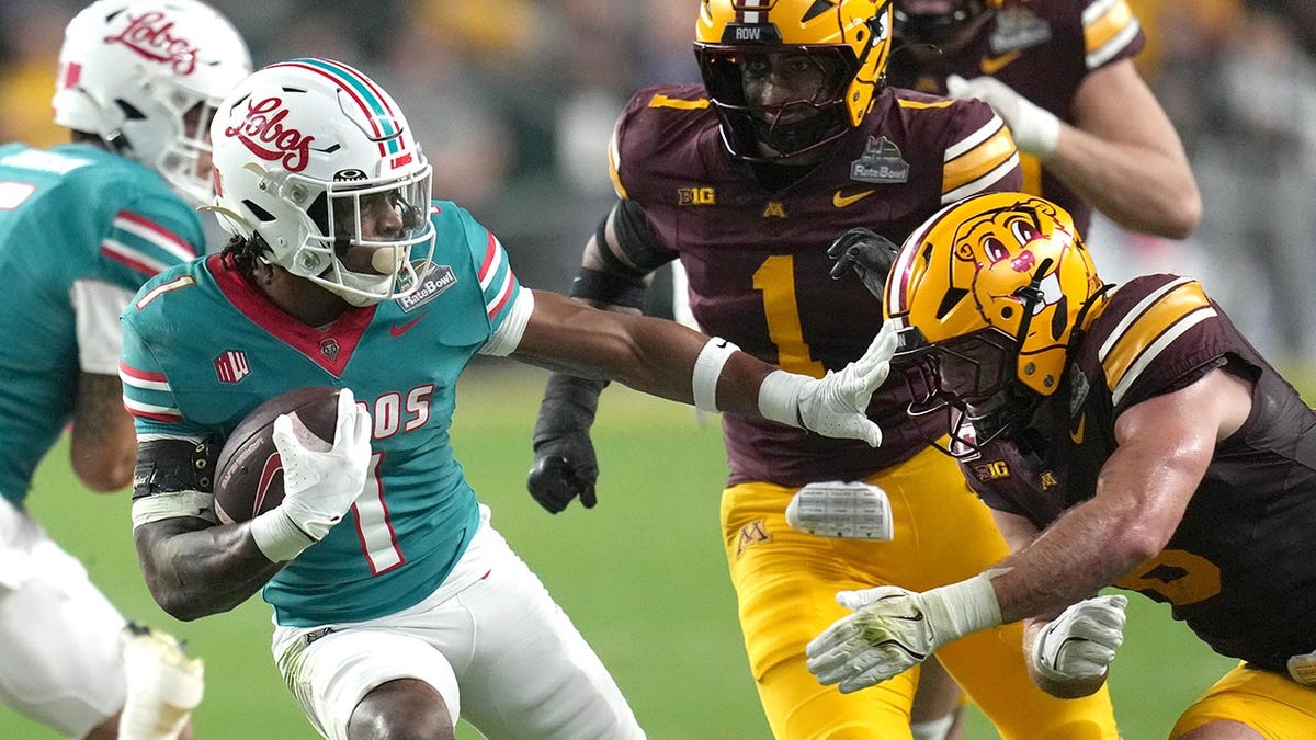 Damon Bankston hits a stiff arm